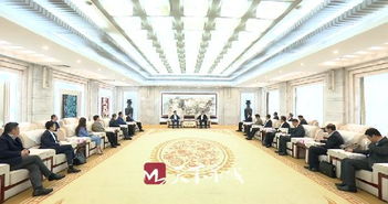 王忠林会见上海中军哈工实业集团董事长林楷森一行